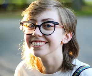 A photo of a smiling attendee